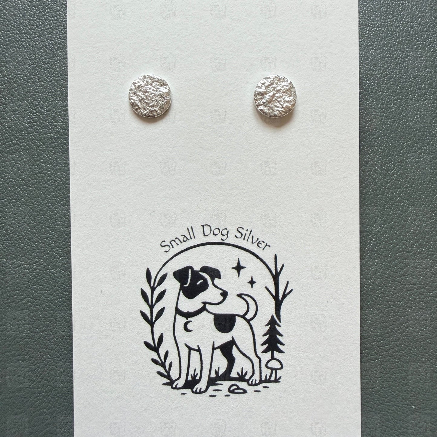 Silver round earrings on a card with 'Small Dog Silver' branding.