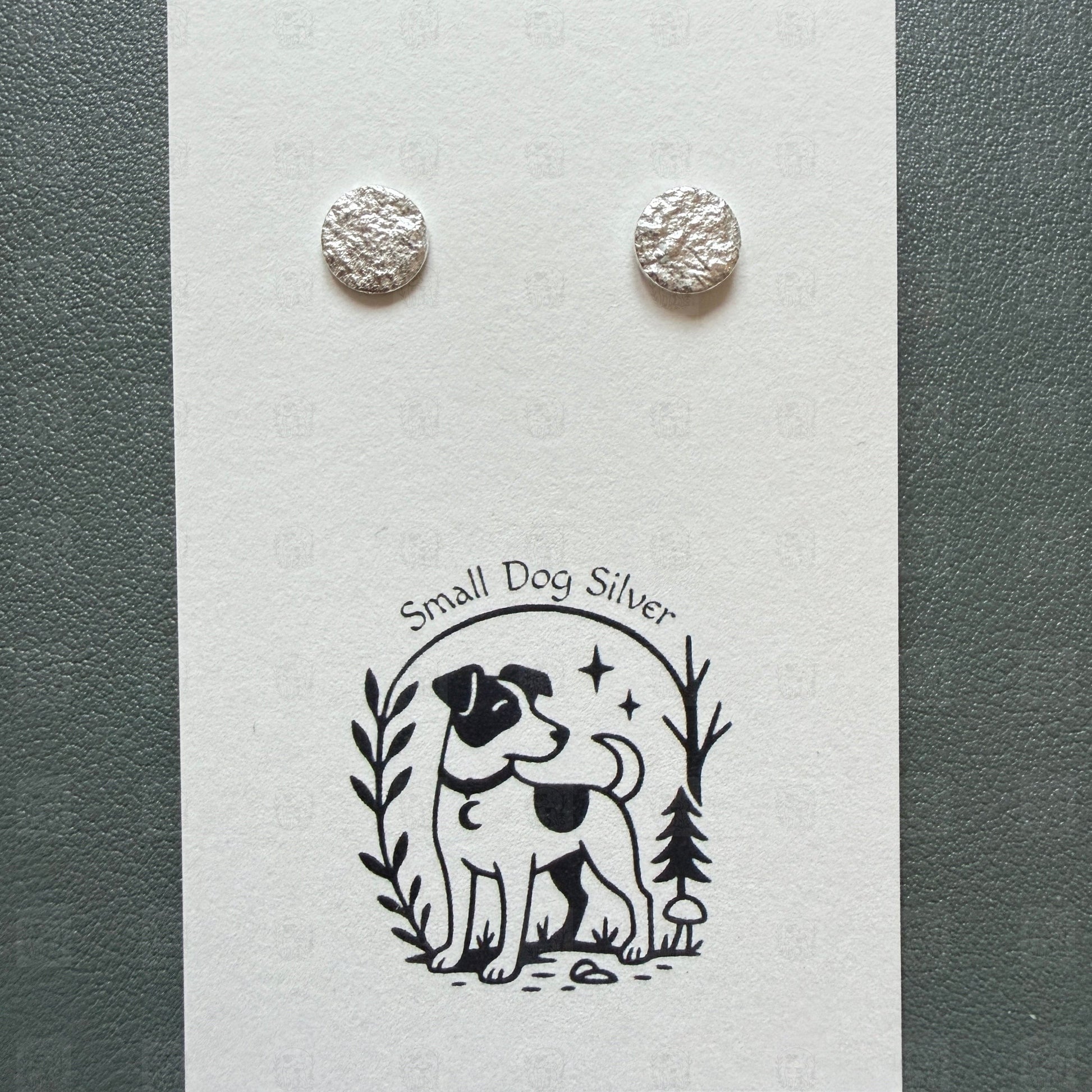 Silver round earrings on a card with 'Small Dog Silver' branding.